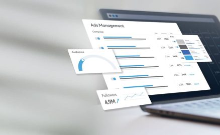 Graphic of a person on laptop viewing digital marketing metrics.